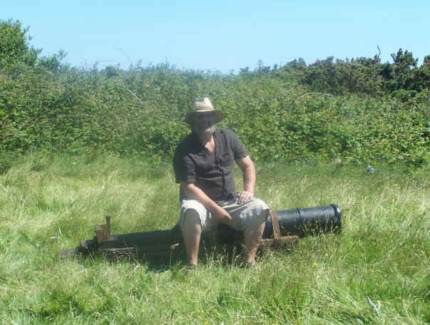 Colin pictured sitting upon one of his cannon.